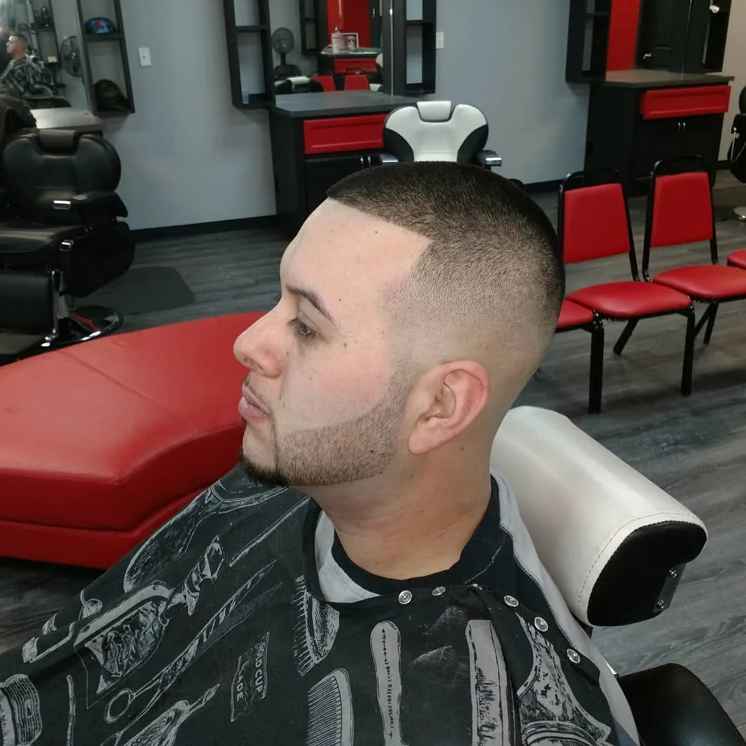 High skin fade with a sculpted beard line