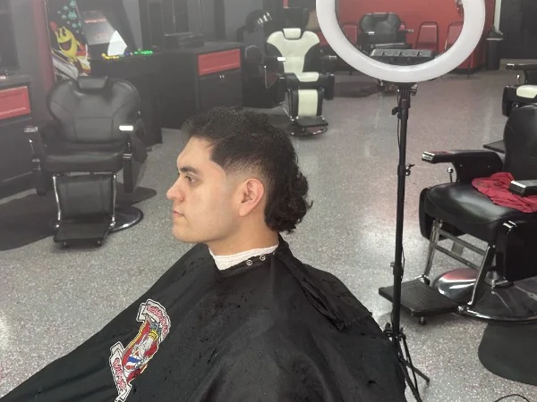 Burst fade mullet with a textured top