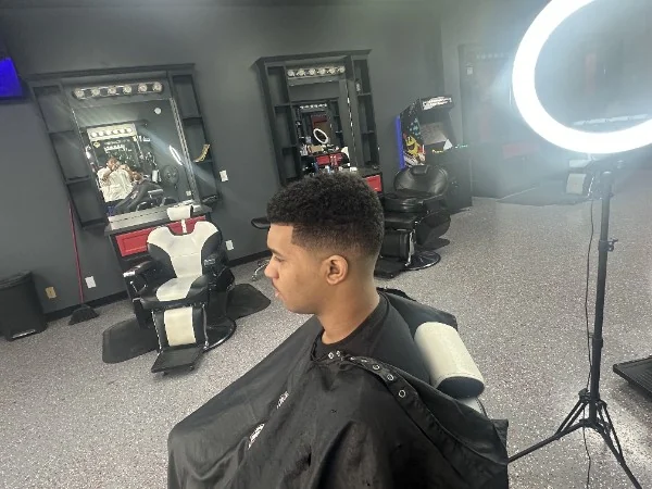 Curly top with a low fade