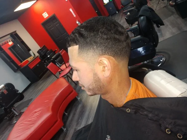 Mid skin fade with a textured top